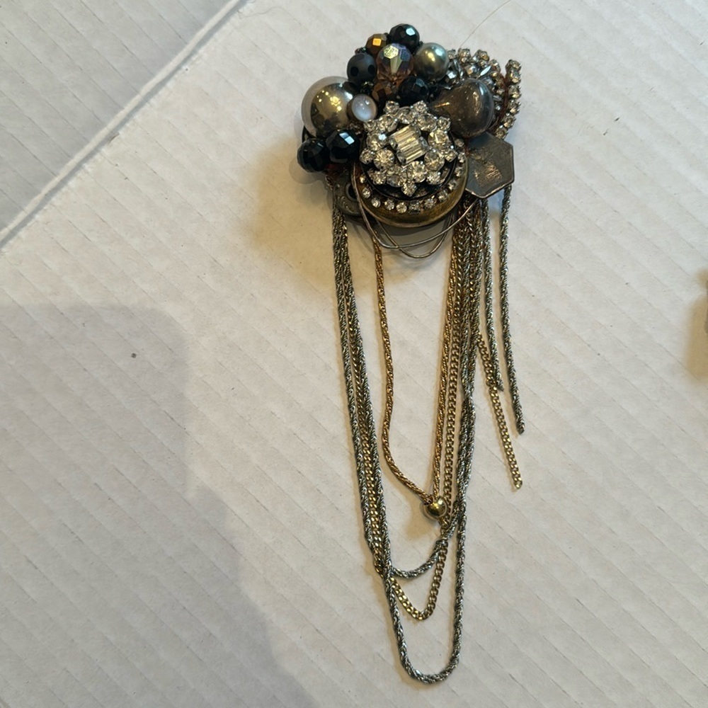 Vintage brooch made with buttons
